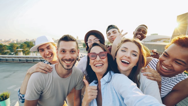 Friends taking a group selfie